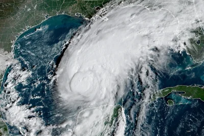 Hurricane Isaias strengthens to a Category 2 storm as it continues moving toward Gulf Coast